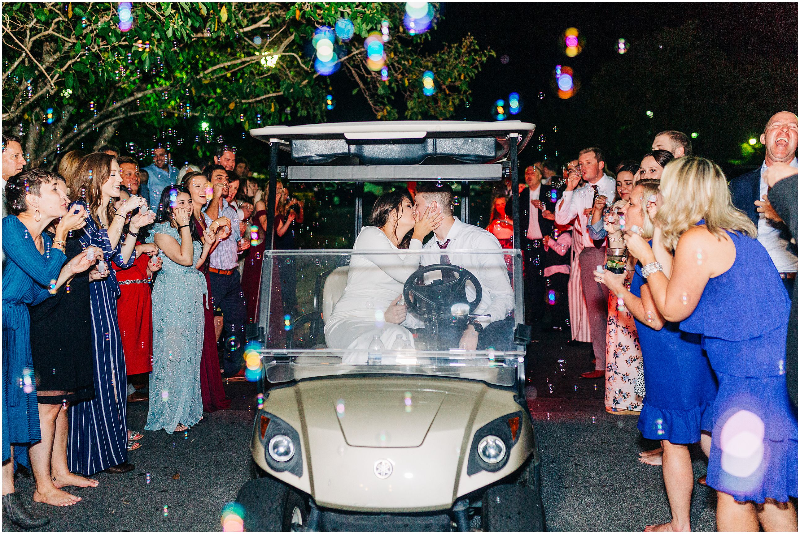 wedding bubble exit on gold cart
